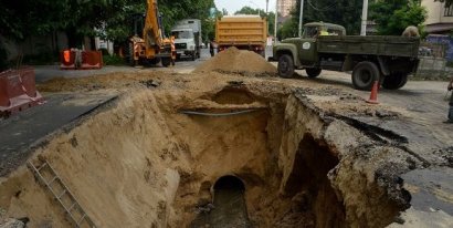 Причиной провалов грунта и разрушения асфальтного покрытия на участке улицы Львовской был производственный дефект нескольких труб